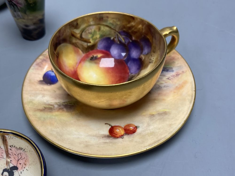 A Royal Worcester miniature cup and saucer painted with fruit, signed W. Hale, height 4cm, two scent bottles and sundries